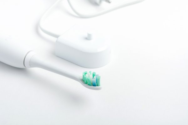 Electric toothbrush with charger